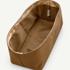 Brown fabric geometric satchel organizer showing the actual pocket construction
