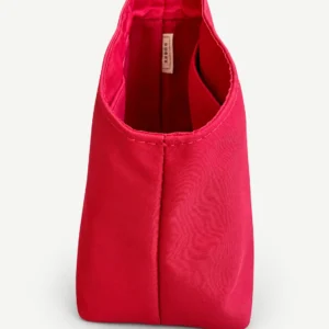 Red fabric relaxed top-handle bag organizer showing the actual pocket construction
