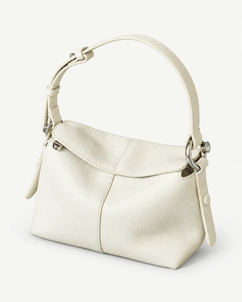 Ivory soft leather shoulder bag on a pale studio background