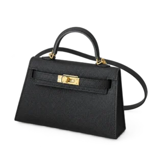 Black textured leather top-handle bag on a pale studio background