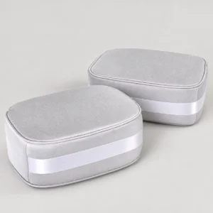 Plume Bag Shaper Pillow textile storage pillow on a neutral background