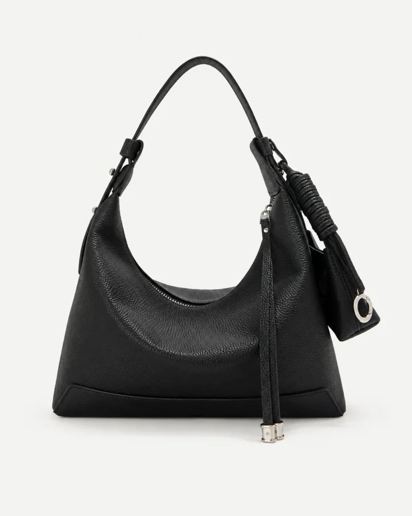 The Curve — Leather Hobo Bag in Black — product color photograph