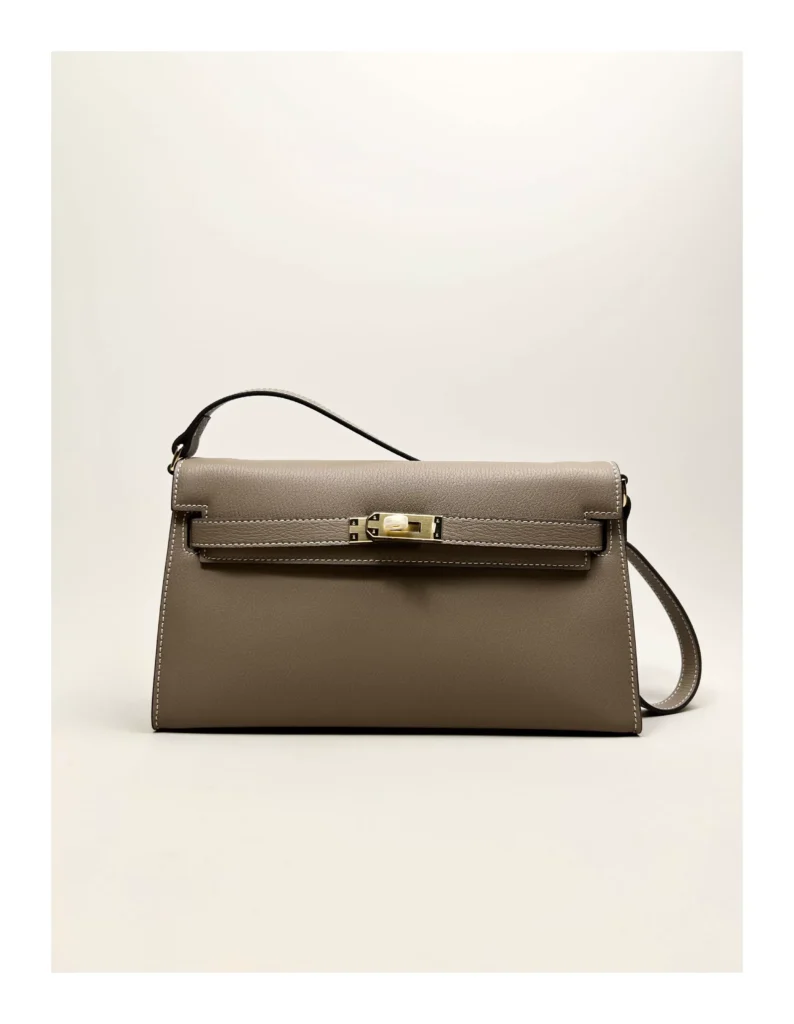 The Evening — Elongated Leather Shoulder Bag — Taupe / Gold-tone