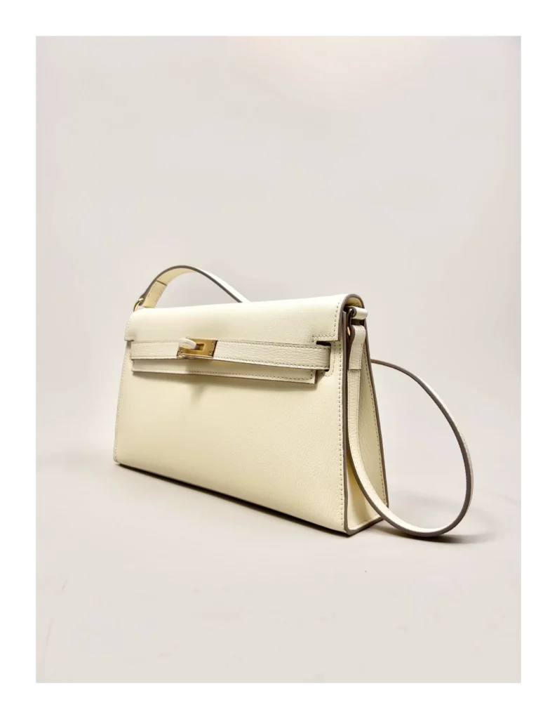 The Evening — Elongated Leather Shoulder Bag — Cream / Gold-tone