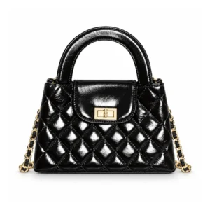 The Chain Top Handle — Quilted Waxed Leather Mini Bag in Black with gold hardware